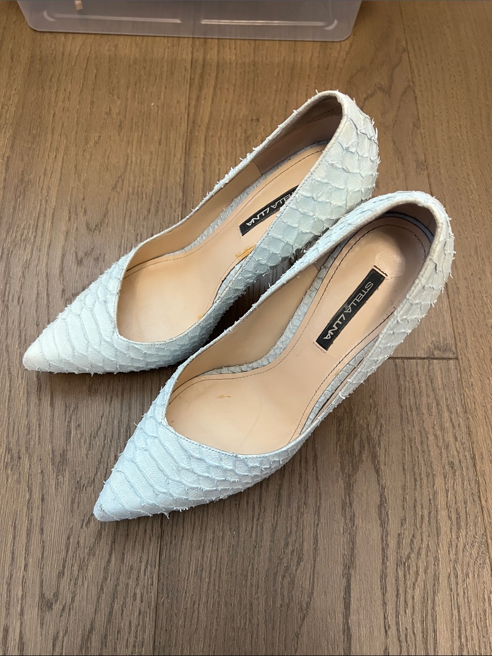 White Textured Pointed-Toe Pumps